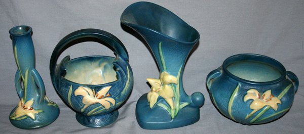 ROSEVILLE POTTERY 'ZEPHYR LILLY' POTTERY VASE: ROSEVILLE POTTERY 'ZEPHYR LILLY' POTTERY VASE, BOWL, ETC., MID 20TH C, 4 PCS., H 4"-8":includes one basket, #390-7"; one candlestick, #201-7"; one Cornucopia vase, #204-8"; one pot, #671-4";