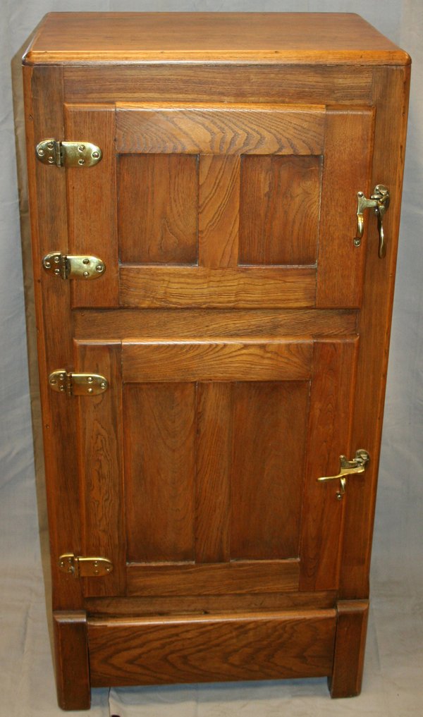 AMERICAN OAK JEALOUS HUSBAND ICE BOX, H 49",: AMERICAN OAK JEALOUS HUSBAND ICE BOX, H 49", L 23", D 16":having two paneled front doors with latches and one paneled door in the rear at top; all having brass hinges and latches; short square legs;