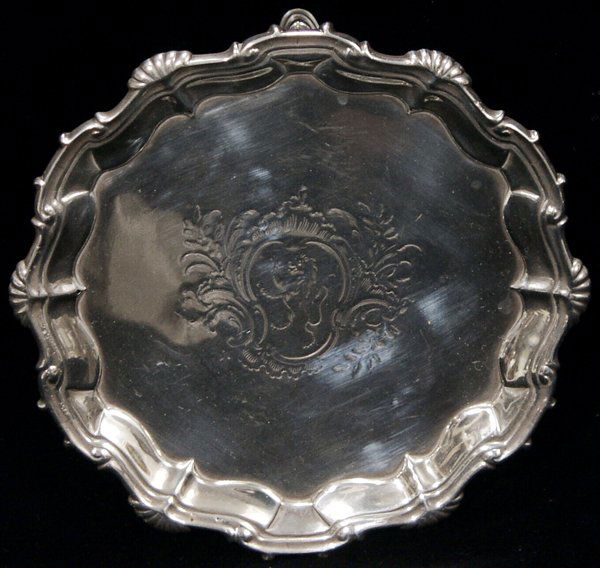GEORGE II STERLING SALVER, ROBERT REW, LONDON,: GEORGE II STERLING SALVER, ROBERT REW, LONDON, 1756-57, DIA 6":A sterling silver salver engraved with a rampant lion crest at the center. Hallmarks include a crowned leopard, lion passant, date letter