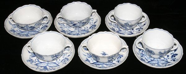 MEISSEN BLUE FLORAL PORCELAIN CREAM SOUP BOWLS: MEISSEN 'BLUE FLORAL' PORCELAIN CREAM SOUP BOWLS (2 SIZES) & 6 UNDER PLATES, DIA 5 1/2":Under glaze crossed swords mark. Twelve pieces total.