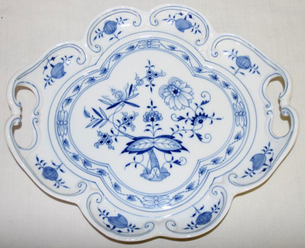 MEISSEN 'BLUE ONION' PORCELAIN PLATTER, L 12": MEISSEN 'BLUE ONION' PORCELAIN PLATTER, L 12":Scalloped lozenge edge, pierced handles. 12" x 10 3/4". Under glaze crossed swords mark. From the Estate of Arnold Hoffman, Grosse Pointe.