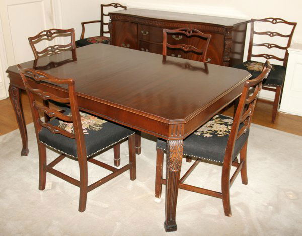 MAHOGANY DINING TABLE, CHAIRS (6), & SIDEBOARD: MAHOGANY DINING TABLE, CHAIRS (6), & SIDEBOARD, C. 1950:Including 1 dining table, H.30" x 62" x 42", with one leaf, W.12"; 1 armchair and 5 side chairs, floral needlepoint upholstery; and 1 sideboard,