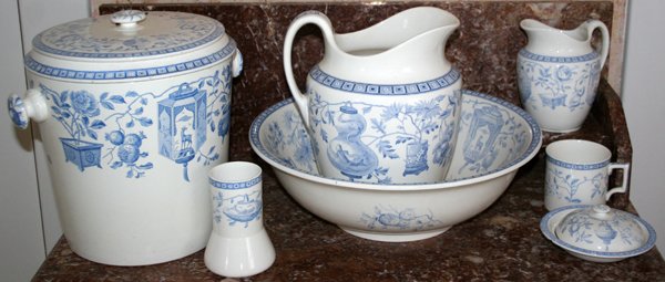 MINTON DEMI PORCELAIN WASH BASIN SET, 7 PCS.: MINTON DEMI PORCELAIN WASH BASIN SET, 7 PCS.:Includes pitcher, H 10", basin, Dia 15", chamber pot, Dia 11", small pitcher, shaving mug, covered dish and jar. Blue and white, marked on underside.