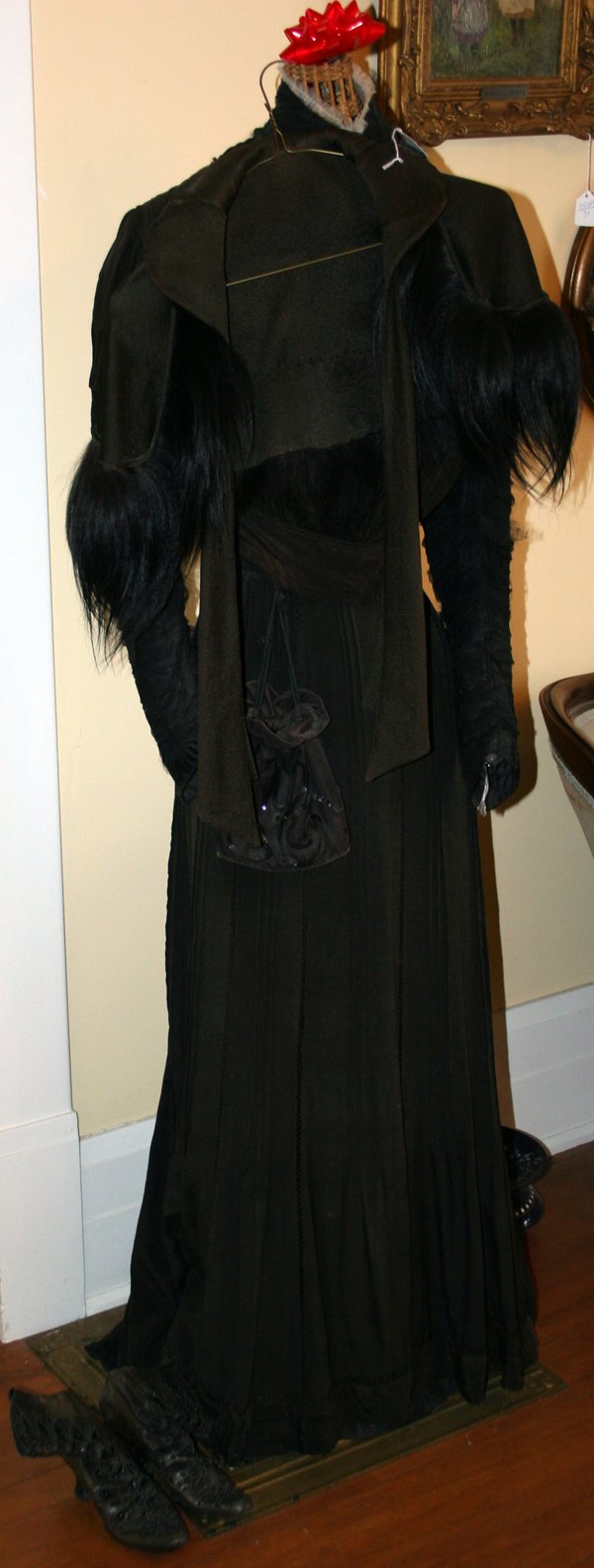 VICTORIAN EVENING DRESS ON WICKER STAND: VICTORIAN EVENING DRESS ON WICKER STAND:With leather boots.