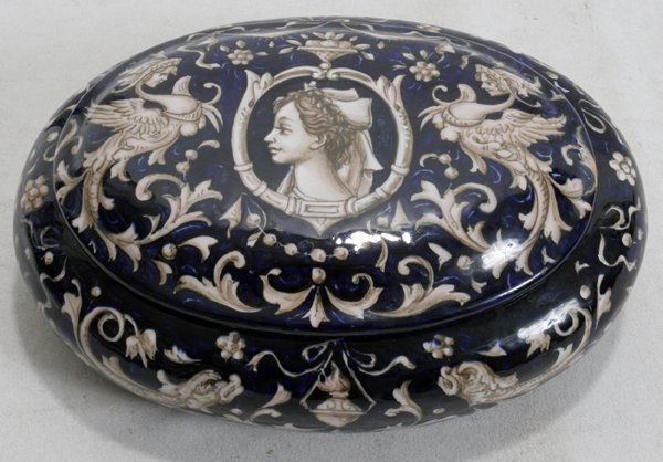 CAPO DI MONTE PORCELAIN DRESSER BOX, H 3", L 8": CAPO DI MONTE PORCELAIN DRESSER BOX, H 3", L 8":Hand-painted with griffins having fish design. Signed on underside;