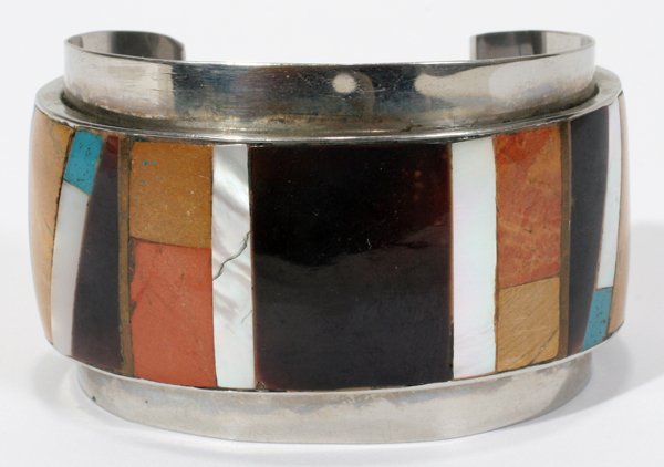 NATIVE AMERICAN SILVER & STONE CUFF BRACELET: NATIVE AMERICAN SILVER & INLAID STONE CUFF BRACELET:An unmarked silver cuff set with a variety of stones including onyx, abalone, and turquoise.