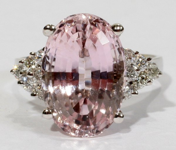 10 CT. NATURAL KUNZITE & 1.10 CT. DIAMOND RING: 10.00 CT. NATURAL KUNZITE & 1.10 CT. DIAMOND RING:Diamonds H-color, Si-1 clarity. 14kt white gold. Size 6. Total weight 5.3 grams.