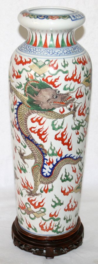 CHINESE WUCAI PORCELAIN & ENAMEL VASE,H 17 1/2": CHINESE WUCAI PORCELAIN & ENAMEL VASE, H 17 1/2", DIA 6":Cylindrical shape with tapering sides, enamel decorated with two dragons, apocryphal mark of Ming Dynasty Jiajing Reign on the neck. Includes a