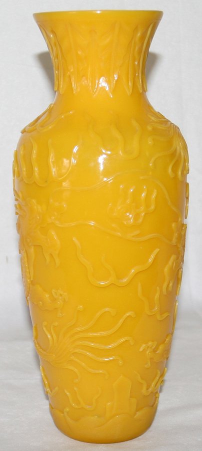 CHINESE PEKING GLASS VASE, DRAGON MOTIF,: CHINESE PEKING GLASS VASE, DRAGON MOTIF, H 12 1/2", DIA 5":Lemon yellow glass vase with raised dragon motif about the exterior, erroneously signed "Legras" at the underside. From the Estate of David S