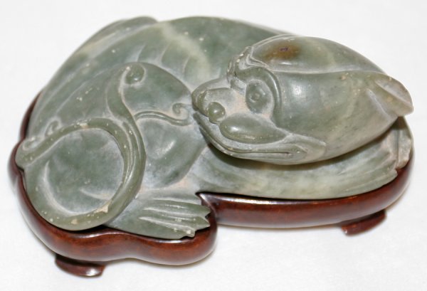 CHINESE CARVED SOAPSTONE DRAGON, L 4 1/4": CHINESE CARVED SOAPSTONE DRAGON, L 4 1/4":On a conformed wood stand. From the Estate of David Steinman, Bloomfield Hills, Michigan.