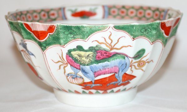 CHINESE RICE BOWL, H 3", DIA 5 3/4": CHINESE RICE BOWL, H 3", DIA 5 3/4":Round porcelain bowl hand-decorated with foo lion, dragon and floral motifs. No apparent marks.