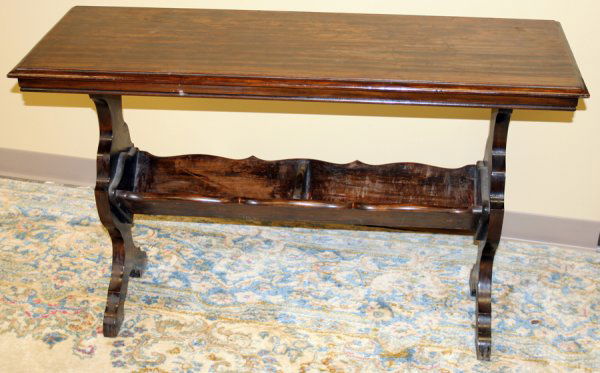 WALNUT OCCASIONAL TABLE, C. 1920, H 29", W 48": WALNUT OCCASIONAL TABLE, C. 1920, H 29", W 48", WITH BOOK TROUGH:Rectangular top with shaped supports joined by a book trough. Measures H.29" x 48" x 19".