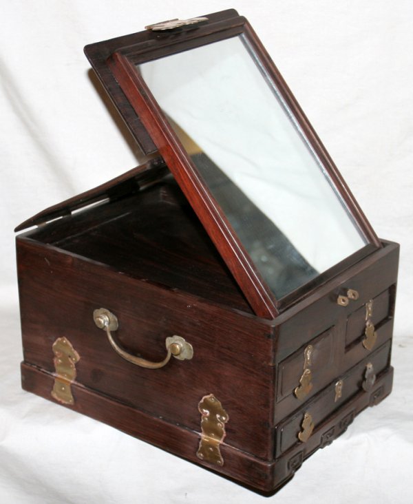 CHINESE ANTIQUE MAKE-UP BOX, H 7", W 9", L 12": CHINESE ANTIQUE MAKE-UP BOX, H 7", W 9", L 12":Three drawers, brass hardware. Hinged lid opens to interior mirror which props up. From the collection of Helen W. Korman of Toledo, Ohio and San Diego, 