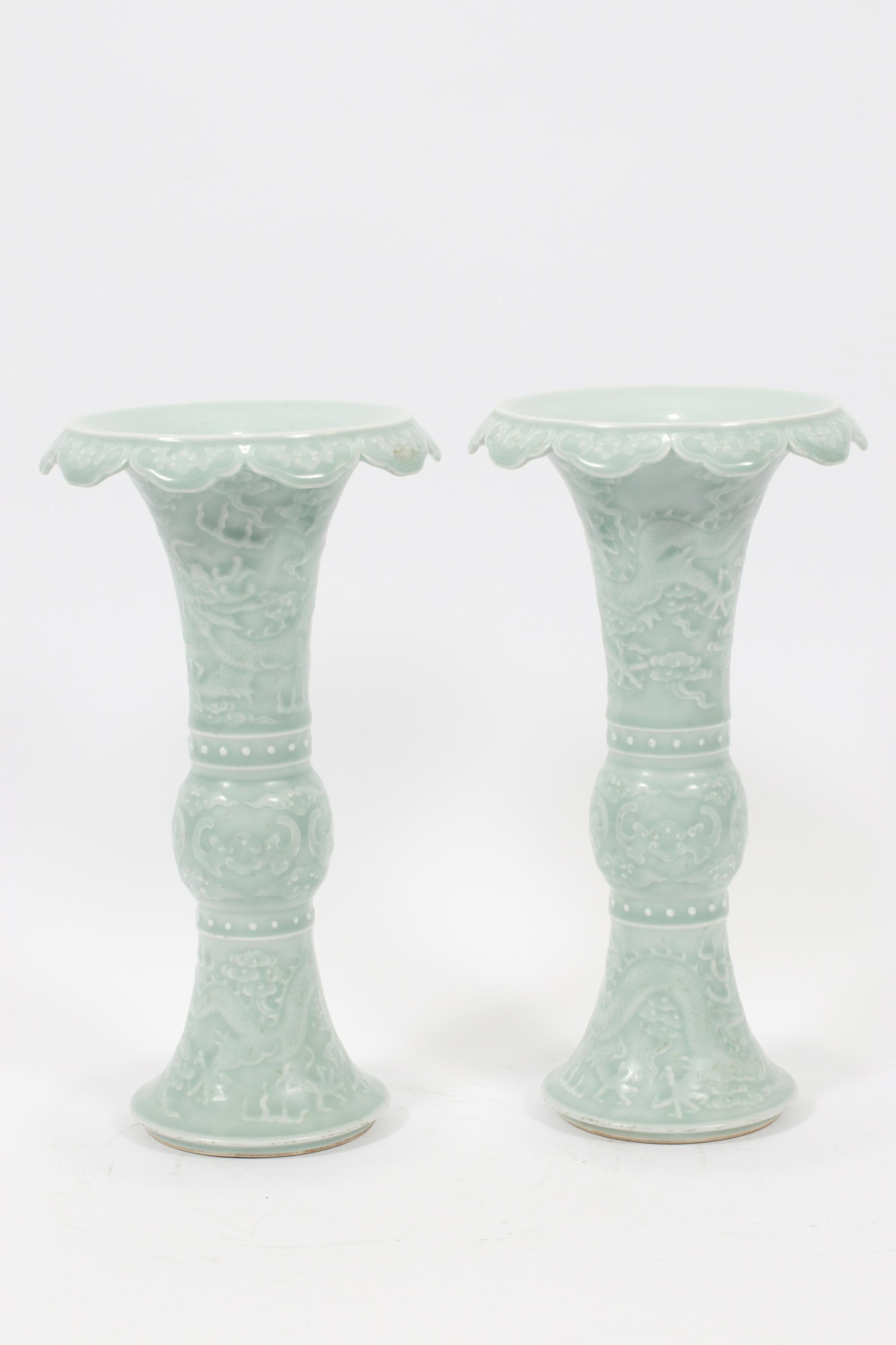 CHINESE PORCELAIN GU BEAKERS, PAIR H 12" DIA 6": CHINESE PORCELAIN GU BEAKERS, PAIR H 12" DIA 6" Celadon with incised design.