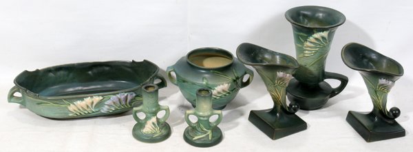 ROSEVILLE 'FREESIA' TABLEWARE, SEVEN PIECES, : ROSEVILLE 'FREESIA' TABLEWARE, SEVEN PIECES, H 3 1/2"-9":Including 1 planter (468-12"), 1 smaller footed vase (463-5"), 1 pair of candlesticks (1161-4 1/2"), 1 taller vase with squat handles and a fla