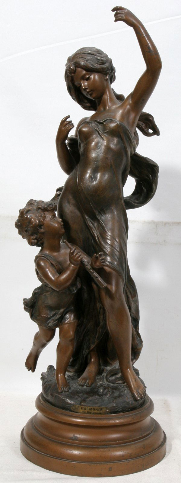 AFTER HIPPOLYTE MOREAU, SPELTER SCULPTURE, H 22: AFTER HIPPOLYTE MOREAU, SPELTER SCULPTURE, H 22", 'CHARMONIE':Made in France Circa 1880. Allegorical figure and putti. With base 24 1/2".