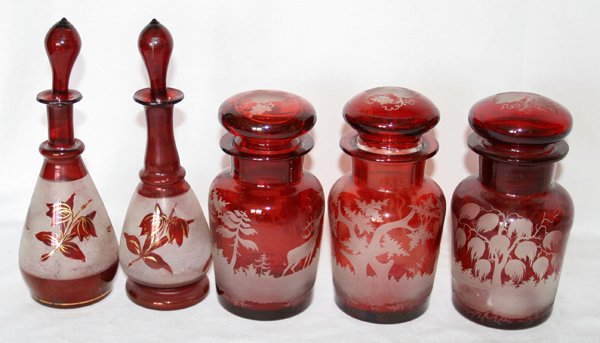 BOHEMIAN ETCHED RUBY GLASS APOTHECARY JARS &: BOHEMIAN ETCHED RUBY GLASS APOTHECARY JARS & COLOGNE BOTTLES, FIVE, H 6" & 8 1/2":Bohemian etched ruby glass includes 3 apothecary jars, H. 6" and 2 cologne bottles, H. 8 1/2.