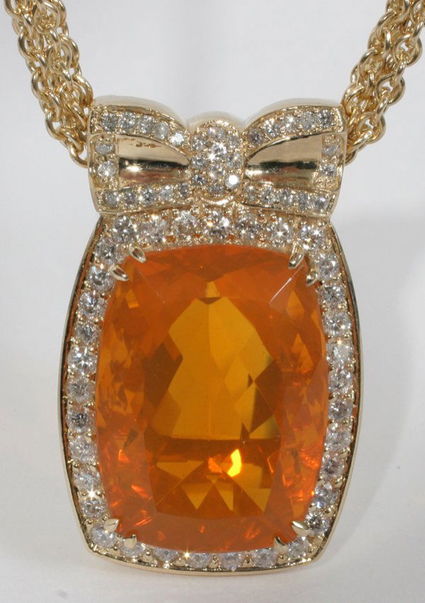 29.60 CT. MEXICAN OPAL & DIAMOND NECKLACE,: 29.60 CT. MEXICAN OPAL & 2.10 CT. DIAMOND NECKLACE, W 3/4", L 1 1/2":Diamonds G-H color, Vs-2 Si-1 clarity. 14kt yellow gold. Total weight 58.8 grams.