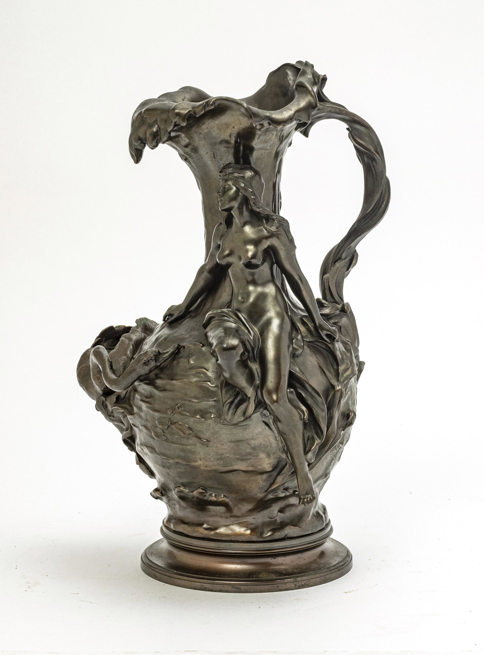 MARCEL DEBUT, FRENCH 1865 - 1933, BRONZE SCULTPURE: MARCEL DEBUT, FRENCH 1865 - 1933, BRONZE SCULTPURE, 19TH/20TH C. H 16" W 9.5" D 10" A finely cast Art nouveau bronze ewer depicting a nude and a swan perched amongst seaweed. The lip of the ewer depic