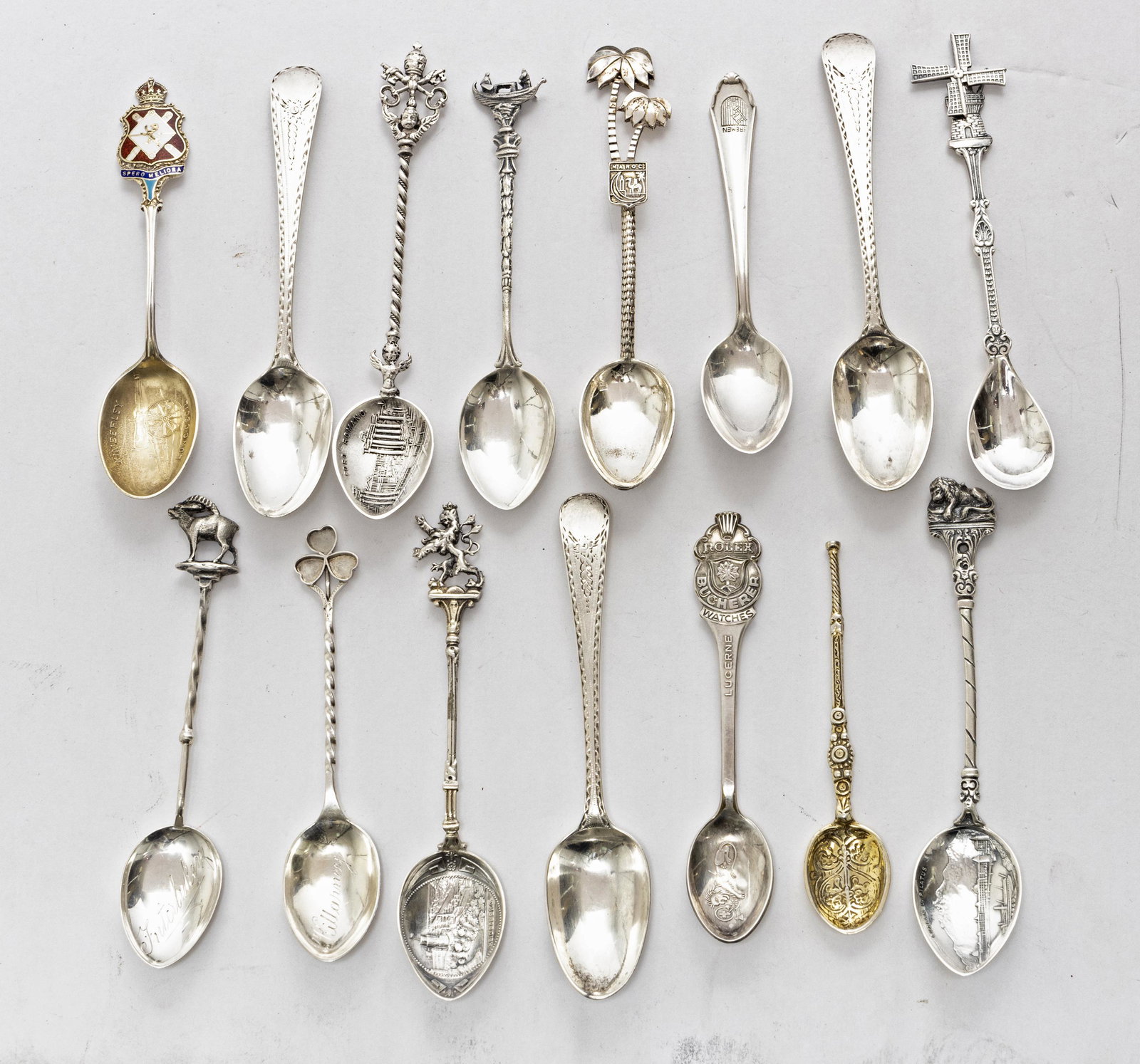 STERLING & 800 DEMI TASSE SPOONS, 12 +3: STERLING & 800 DEMI TASSE SPOONS, 12 +3, SOUVENIR C 1900 Heidelberg lion crest, Luzern lion tip, Interlaken ram tip, Rome crown and angel, Venice gondola, Holland windmill, Morocco camel, Killarney sh