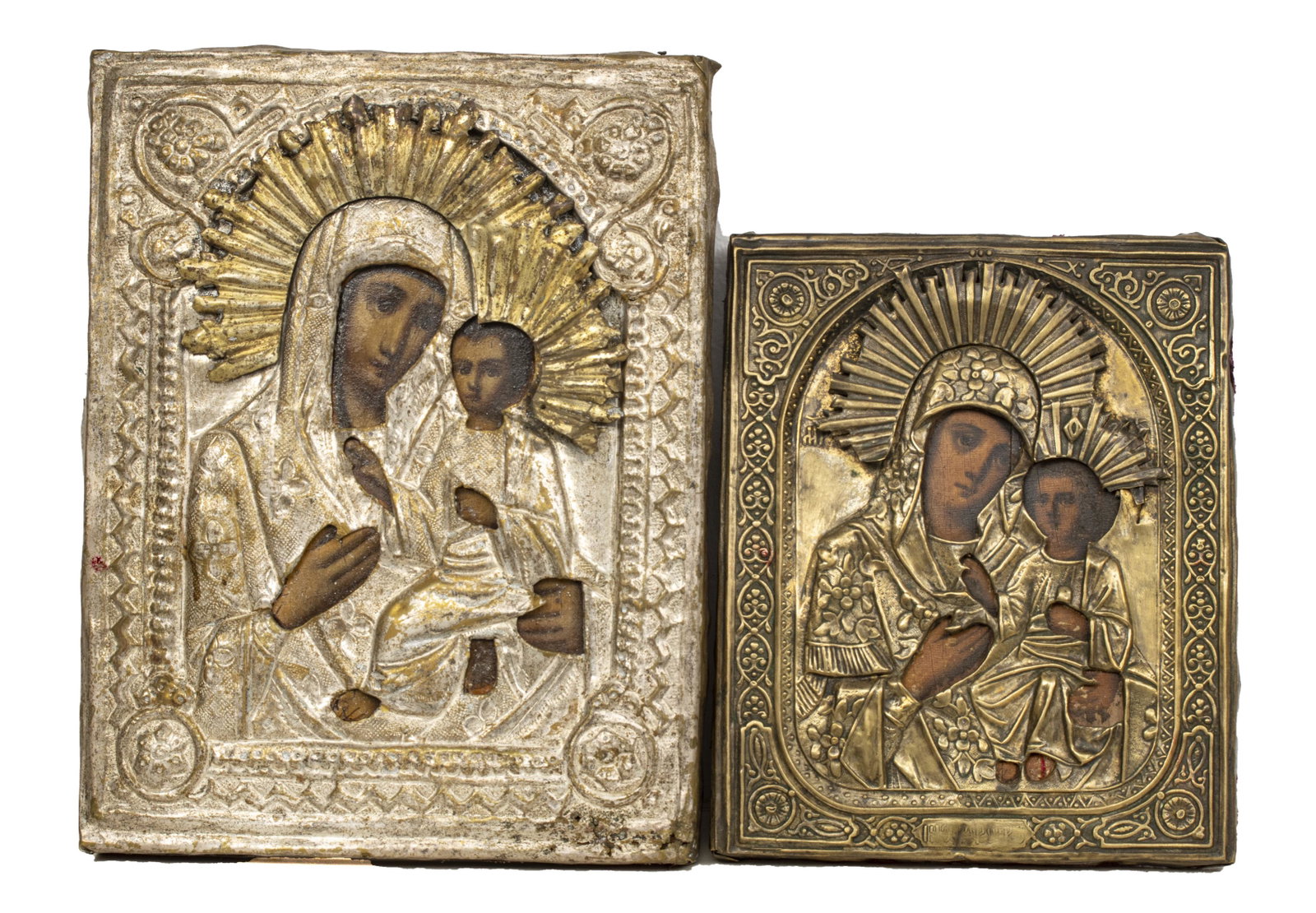 RUSSIAN ICONS, TWO, VIRGIN OF KAZAN: RUSSIAN ICONS, TWO C 1900 H 9" - 7" VIRGIN OF KAZAN Egg tempera on wood. Both icons of Virginof Kazan encased in metal oklad. Brass rizas. Provenance: From the Estate of Dr. James Letson, Saginaw, MI