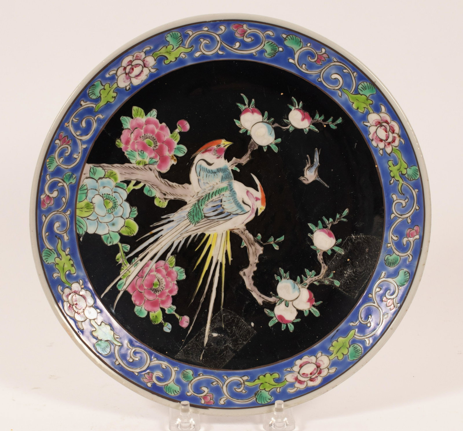 CHINESE SIGNED PORCELAIN CHARGER FLOWERS AND BIRDS: CHINESE SIGNED PORCELAIN CHARGER FLOWERS AND BIRDS C 1900 DIA 9.5" Famille noir hand Painted Enamel Decoration, having Bat, exotic Birds, colors of Black, Blue, Green, and Rose Pink