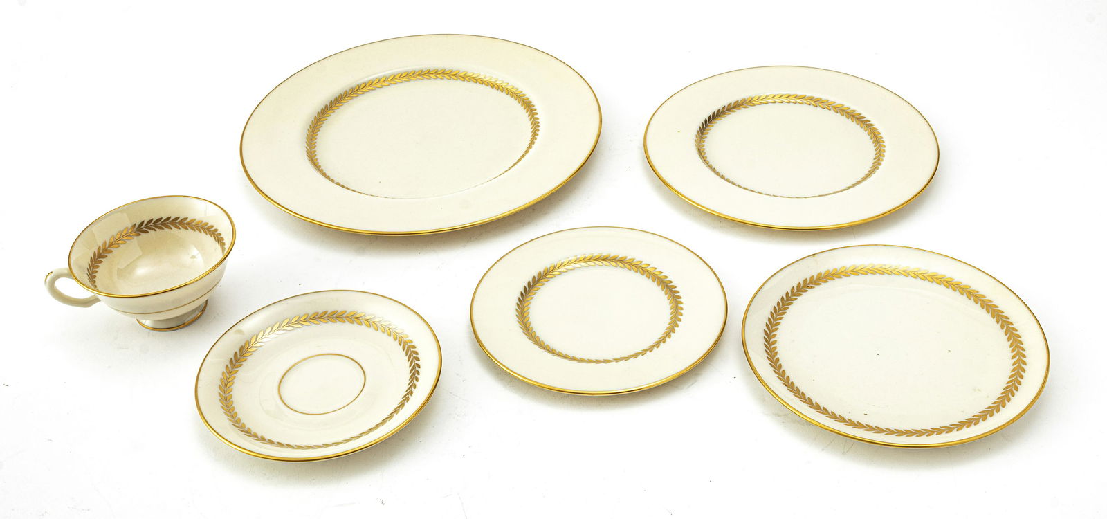LENOX "IMPERIAL" PATTERN PORCELAIN DINNER SET: LENOX "IMPERIAL" PATTERN PORCELAIN DINNER SET 56 PCS. DIA 9.5" Fired gold border with center wreath designs. 14 dinner plates 10.3", 11 cups, 11 saucers, 11 bread plates 6.2", 8 salad plates 8.2", 1 7