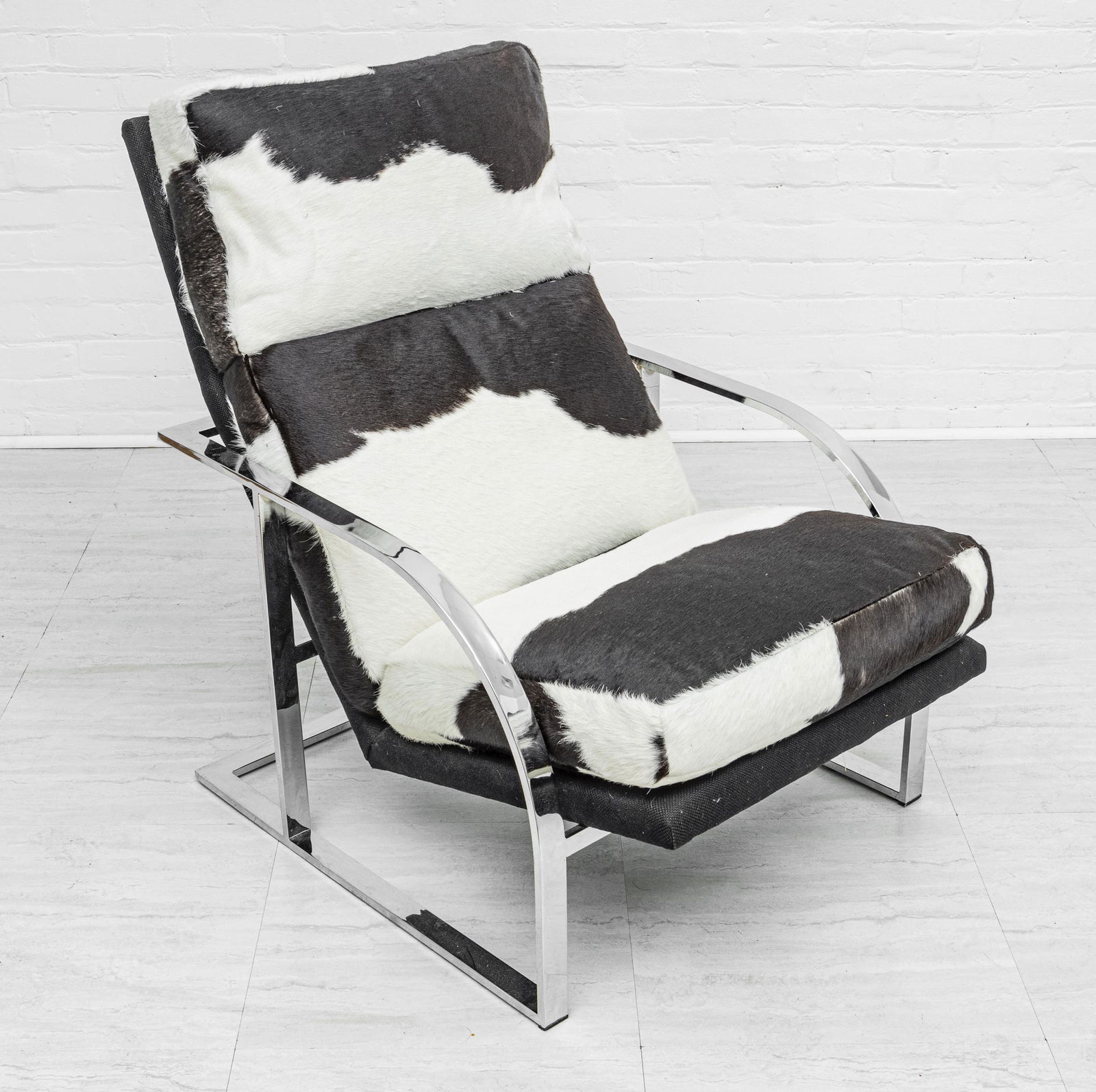 MID CENTURY MODERN COWHIDE & CHROME ARMCHAIR (1 of 2)