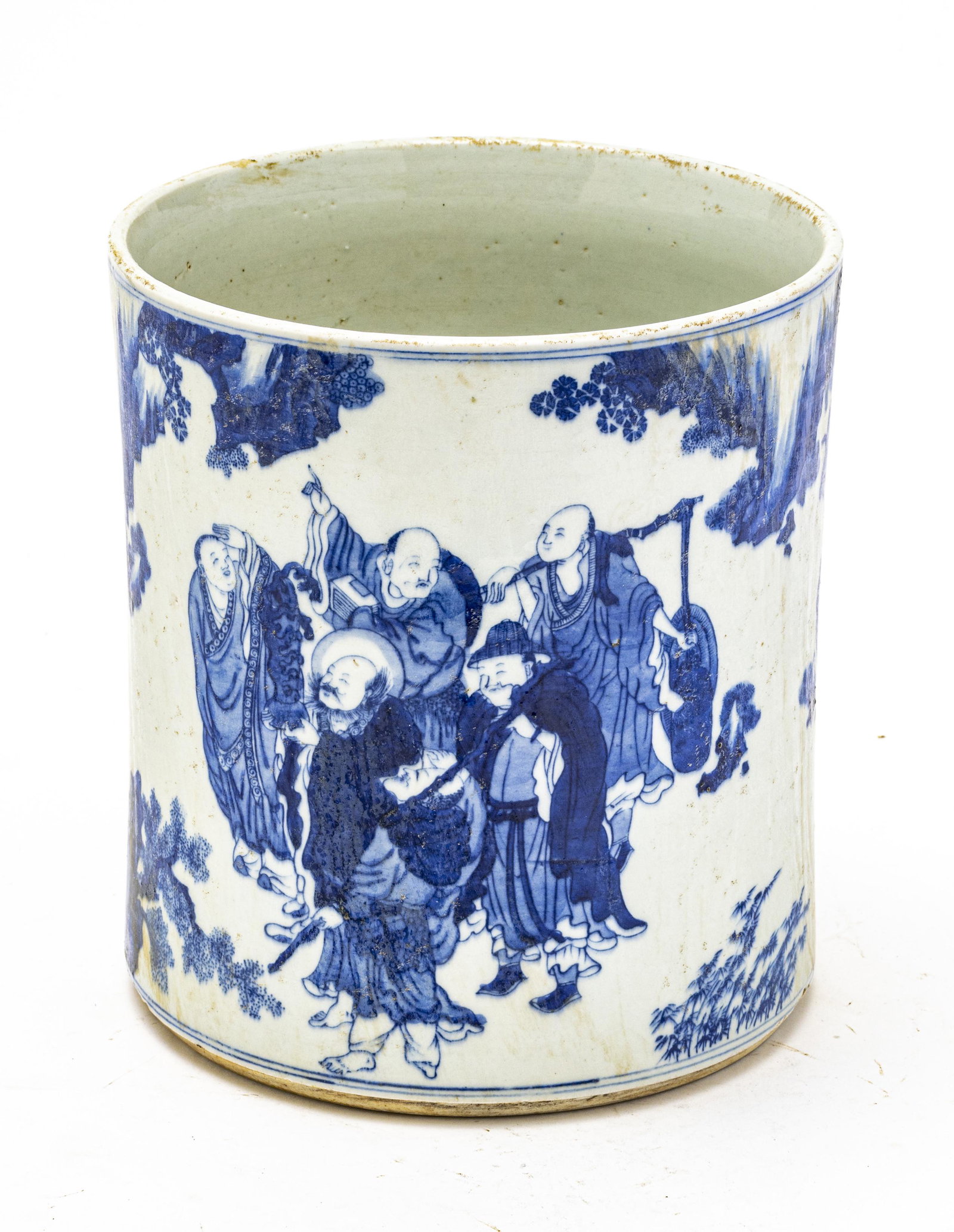 CHINESE BLUE & WHITE PORCELAIN BRUSH POT: CHINESE BLUE & WHITE PORCELAIN BRUSH POT H 8.5" W 7.5" Motif of multiple traveling figures.