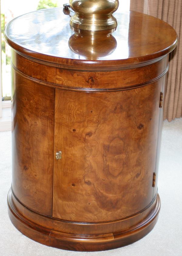 HENREDON BURL WALNUT END TABLE, H 25", DIA 21": HENREDON BURL WALNUT END TABLE, H 25", DIA 21":Cylindrical shape with single door. Original label within.