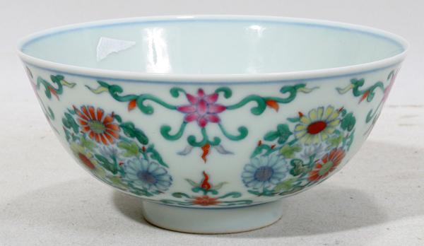 CHINESE PORCELAIN BOWL, H 2 1/4", DIA 4 3/4": CHINESE PORCELAIN BOWL, H 2 1/4", DIA 4 3/4":Light ground with bats on the interior and the exterior having multi-colored floral design. Stamped on underside.