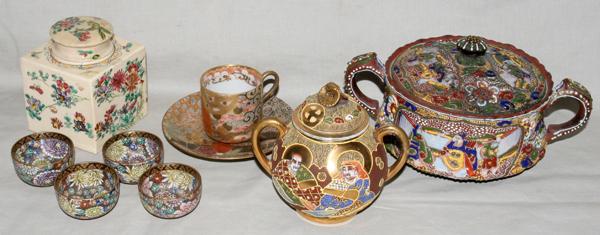 JAPANESE SATSUMA WARE, NINE PIECES: JAPANESE SATSUMA WARE, NINE PIECES:Ensemble includes four sake cups (with marks on underside), one tea cup and saucer, one covered sugar bowl (with mark on underside), one small covered bowl with hand
