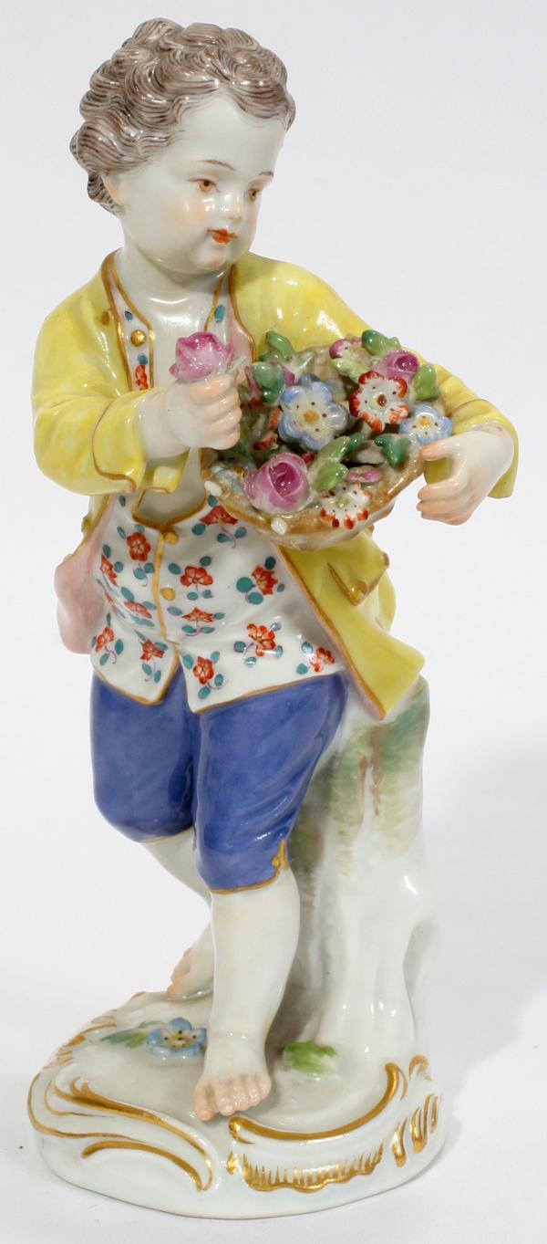 MEISSEN PORCELAIN FIGURINE, LITTLE BOY WITH: MEISSEN PORCELAIN FIGURINE, 19TH C., LITTLE BOY WITH FLOWERS, H 5":Crossed swords mark in blue under glaze; incised numbers 142 and 5.