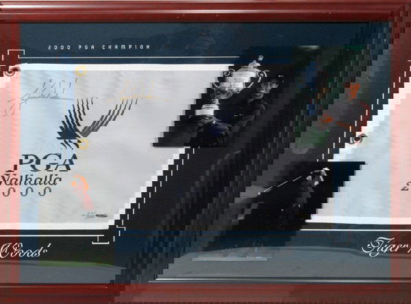 PGA VALHALLA 2000 FLAG AUTOGRAPHED TIGER WOODS: PGA VALHALLA 2000 FLAG AUTOGRAPHED BY TIGER WOODS, 23/500, H 13 1/2", W 20":Tiger Woods Autographed 2000 PGA Championship Pin Flag with Photos, under glass, matted and framed, includes a "Upper Deck A