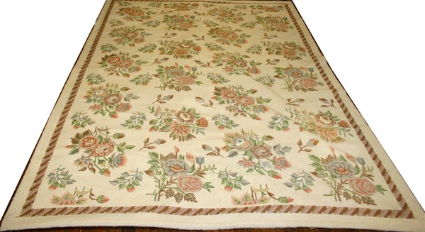 ANTIQUE NEEDLE POINT RUG, 20TH C, 6'10" X 8"8": ANTIQUE NEEDLE POINT RUG, 20TH C, 6' 10" X 8" 8":having beige ground, two borders and rose designs throughout;