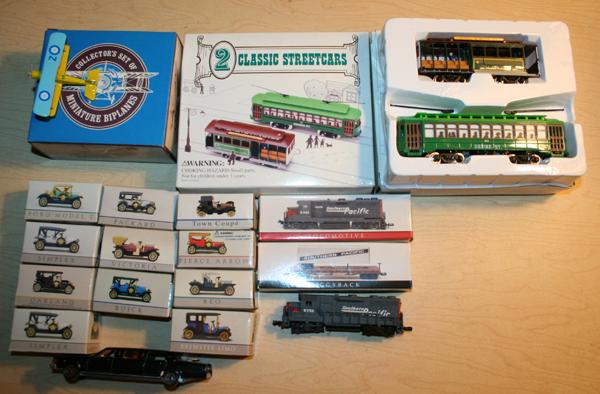 HIGH SPEED METAL PRODUCTS MINIATURE CLASSIC TOY: HIGH SPEED METAL PRODUCTS MINIATURE CLASSIC TOY CARS TRAINS AND AIRPLANES, 21 PCS., L 3" - 6":includes two Southern Pacific, HO scale diesel locomotives, one in original box, piggyback flat car in ori