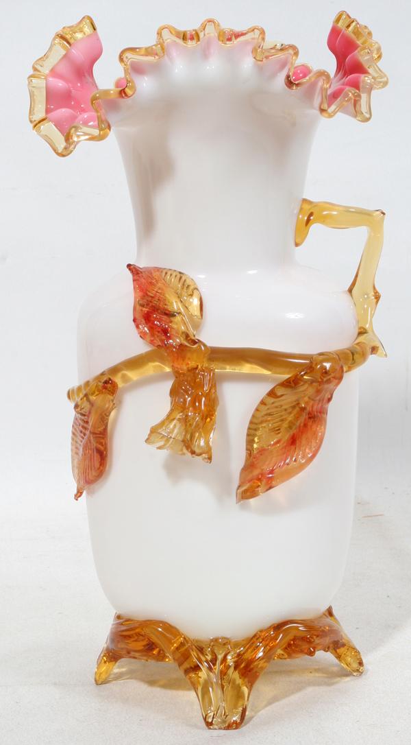 VICTORIAN GLASS VASE, C. 1880, H 10 5/8": VICTORIAN GLASS VASE, C. 1880, H 10 5/8":Possibly Stevens and Williams. Cased white over white in color with amber applied vine design and amber feet.