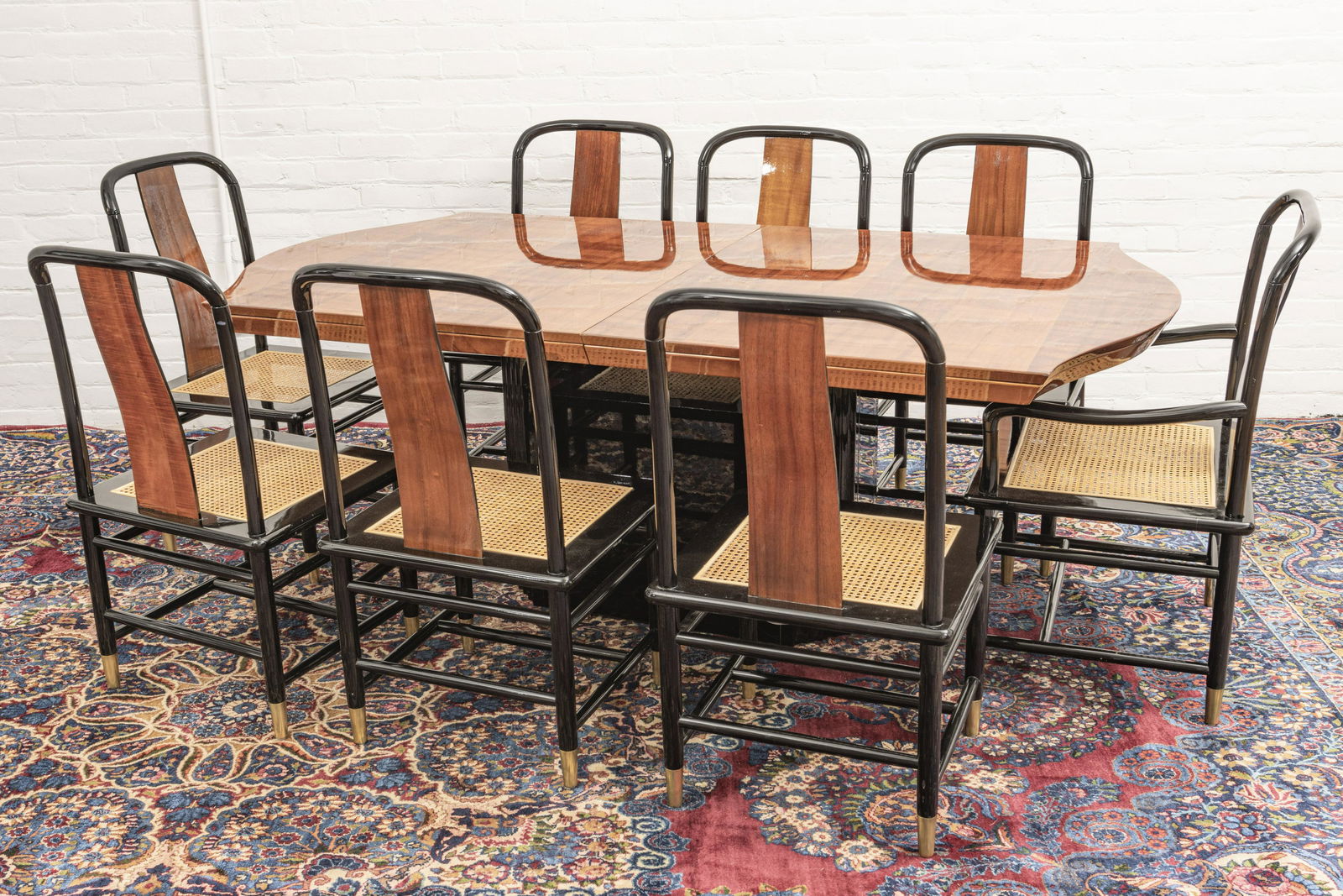HENREDON, ELAN KOA WOOD DINING SET: HENREDON, ELAN COLLECTION BLACK LACQUER AND KOA WOOD DINING SET, TABLE, 8 CHAIRS W 44" L 101" (INCLUDING 21" LEAF) Dining table, with one 21" leaf, two arm chairs and six side chairs. Caned seats with