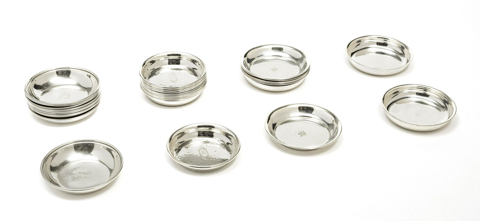 STERLING SILVER COASTERS 28PCS DIA 2.7", 18 T.O.: STERLING SILVER COASTERS 28PCS DIA 2.7", 18 T.O. Coasters and nut dishes. Different makers. 18 tr oz. Some with monograms.
