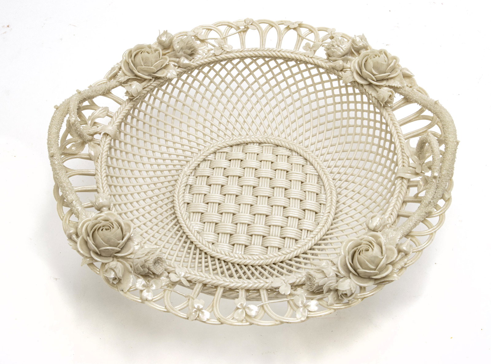 BELLEEK FOUR STRAND OVAL BASKET, H 3", DIA 9 3/4": BELLEEK FOUR STRAND OVAL BASKET, H 3", DIA 9 3/4" Raised flowers in full relief.