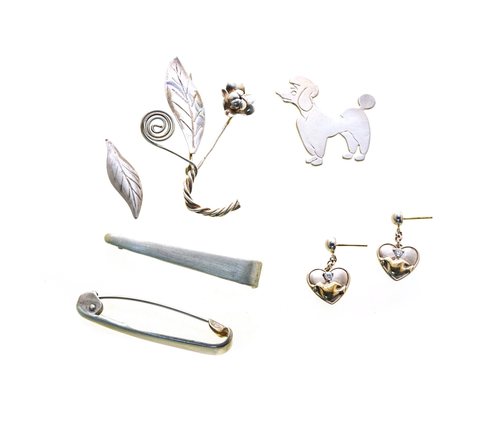 STERLING BROOCHES, FOUR + GORHAM EARRINGS: STERLING BROOCHES, FOUR + GORHAM EARRINGS One "Beau" sterling poodle pin 1 1/4", One handmade flower brooch with broken petal. Also two Napier sterling 2" bar pins. Gorham sterling earrings with heart