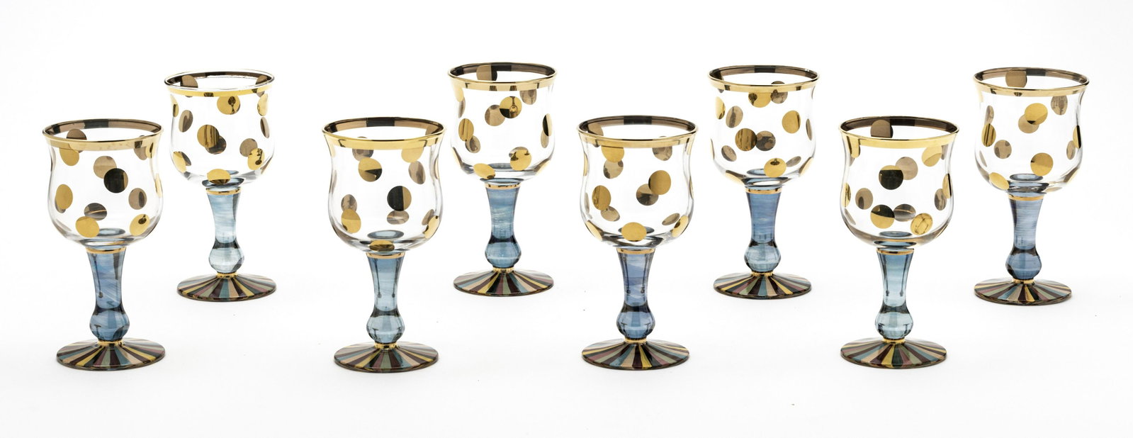 MACKENZIE-CHILDS (AMERICAN) PAINTED WINE GLASSES: MACKENZIE-CHILDS (AMERICAN) HAND PAINTED FOXTROT WINE GLASSES, 8 PCS, H 6.25" Striped bases with gold dot designs. Mackenzie-Childs brandings on the bottoms.