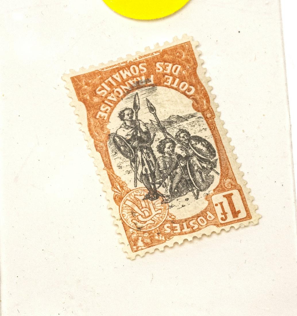 INVERTED SOMALI WARRIORS AFRICAN STAMP: INVERTED SOMALI WARRIORS AFRICAN NATION 1 FRANC, FRANCAISE, ORANGE/BLACK STAMP H, MINT,UNUSED ANTIQUE (1) H 8.5" W 5.5"SLEEVE Good condition.