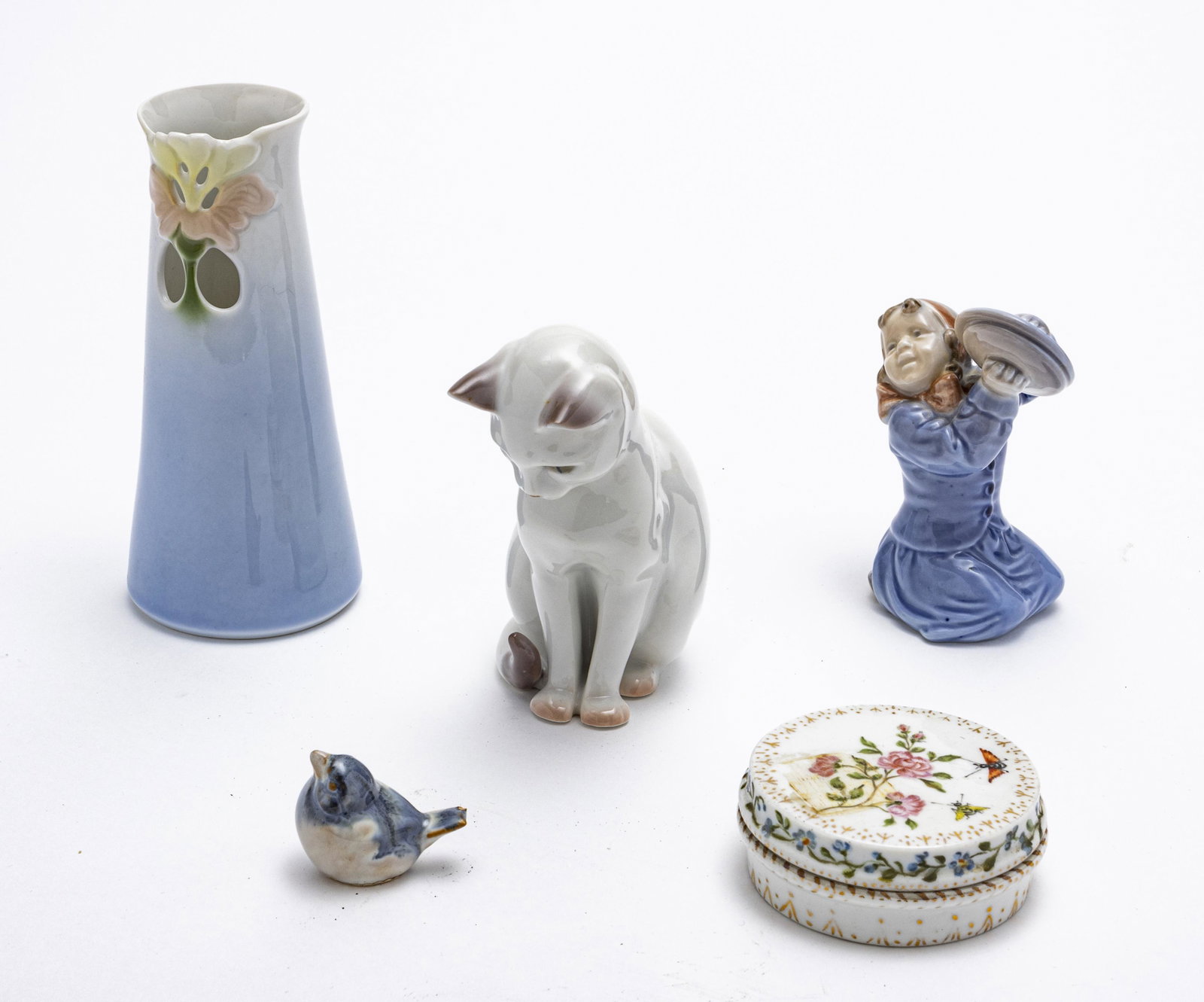 ROYAL COPENHAGEN, PORCELAIN FIGURINES & VESSEL: ROYAL COPENHAGEN, B&G, ETC. PORCELAIN FIGURINES & VESSEL, 5 PCS, H 1"-5.5" Offering a Bing & Grondahl cat and vase, Royal Copenhagen girl with cymbals, Dissing Keramik bird, and F&M porcelain covered 