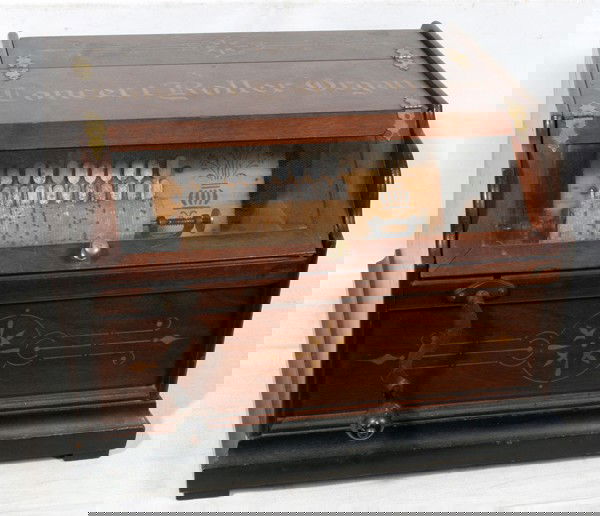 MAHOGANY CONCERT ROLLER ORGAN, H 12", W 14",: MAHOGANY CONCERT ROLLER ORGAN, H 12", W 14", D 10":having mahogany case with slant top glass hinged access door and inscribed on top of box in fruitwood inlay "Concert Roller Organ"; fruitwood inlay d