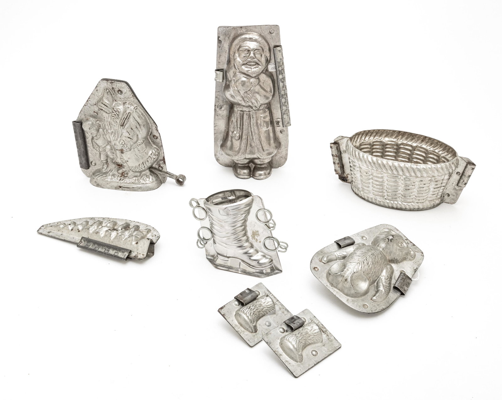ANTIQUE HOLIDAY THEMED METAL CHOCOLATE MOLDS, H 2.75" (1 of 2)