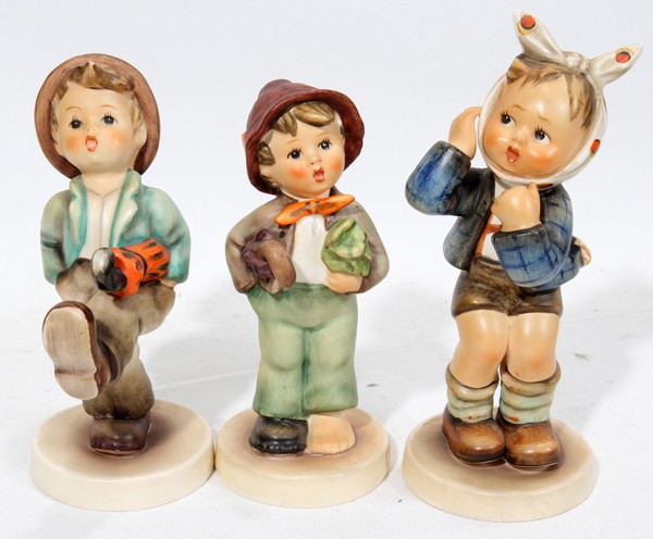 HUMMEL FIGURINES THREE: HUMMEL FIGURINES THREE:"Toothache" #217 3 line mark; "Happy Traveler" #109/0 stylized bee; "Lost stocking", #3742 last bee mark.