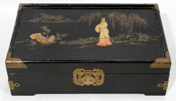 ORIENTAL WOOD AND HARD STONE JEWELRY BOX: ORIENTAL WOOD AND HARD STONE JEWELRY BOX:depicts female figure in hard stone relief. Gilt scene in background; engraved brass trim at the corners; brass latch and bezel;