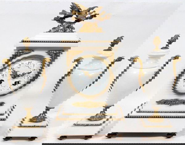 ALABASTER & GILT METAL CLOCK GARNITURE, 3 PCS: FRENCH STYLE ALABASTER & GILT METAL CLOCK GARNITURE, THREE PIECES, H 12":Including 1 mantel clock with enamel dial, H.12 1/2" x 6 1/4" x 4 1/2", and a set of 2 urns, H.9 1/2"; all mounted with gilt me