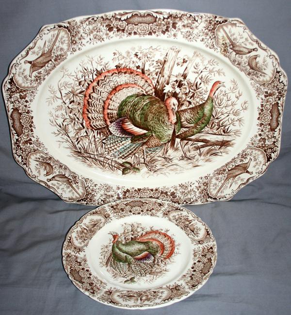 JOHNSON BROTHERS WILD TURKEY EARTHENWARE PLATES: JOHNSON BROTHERS 'WILD TURKEY' EARTHENWARE PLATES & PLATTER, NINE PIECES, L 20", DIA 10 3/4":Including 8 plates and 1 platter, W. 16", L. 20". All are marked "Wild Turkey Native American Windsor Ware
